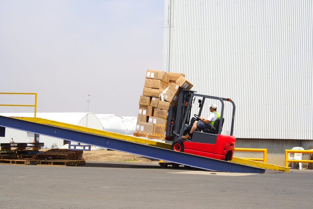 How to Drive a Forklift Down a Ramp